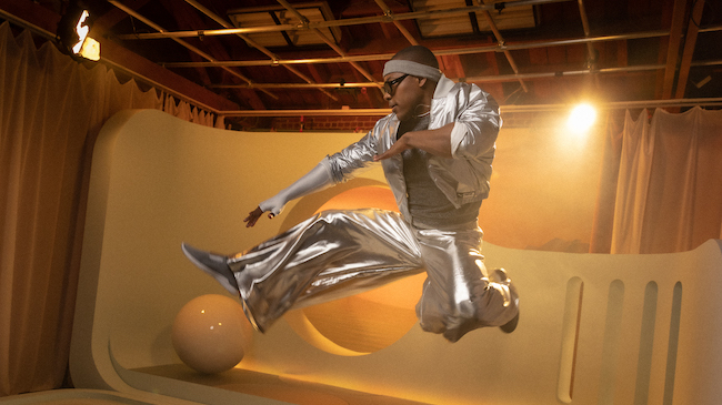 Ridge Davis does a jumping kick on the set of Balacize