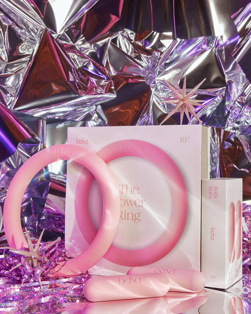 The Suite of Bala products styled for holiday with a mylar backdrop