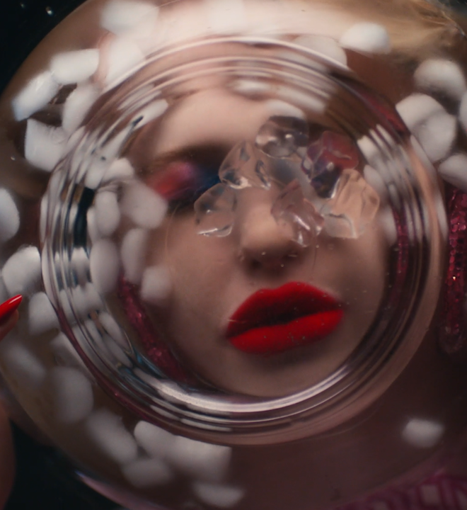 Chloe Cherry dips her head into icewater