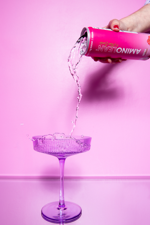 Pouring Aminolean energy drink