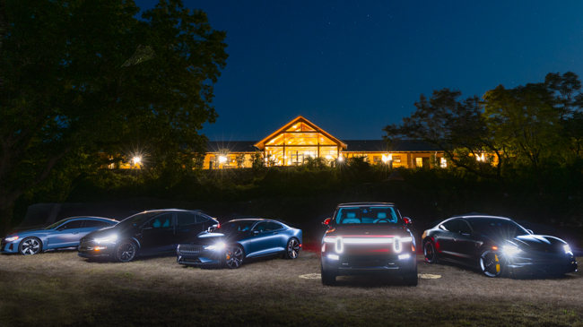 Electric Vehicles in front of a hill country lodge