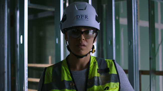 DPR Construction worker looking into camera
