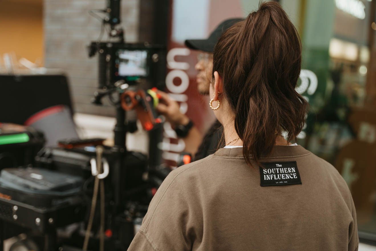 Crew members look on during The Southern Influence's shoot with DPR Construction 