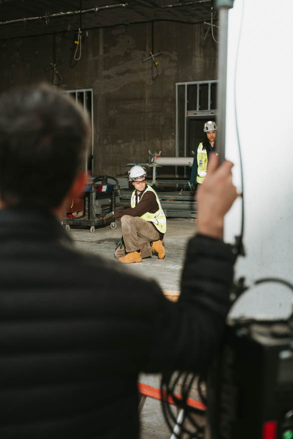 Crew members look on during The Southern Influence's shoot with DPR Construction 