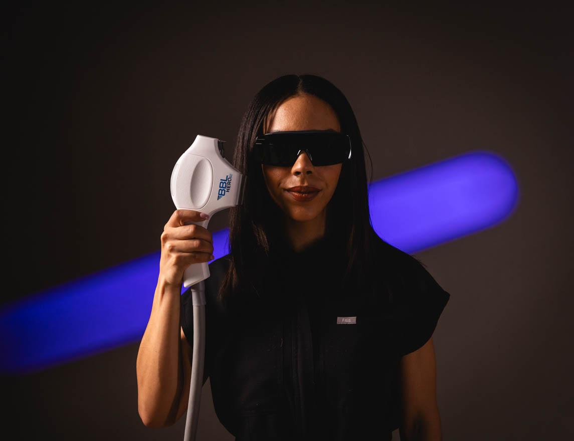 A treatment provider with the Sciton BBLink glasses and BBL Heroic device