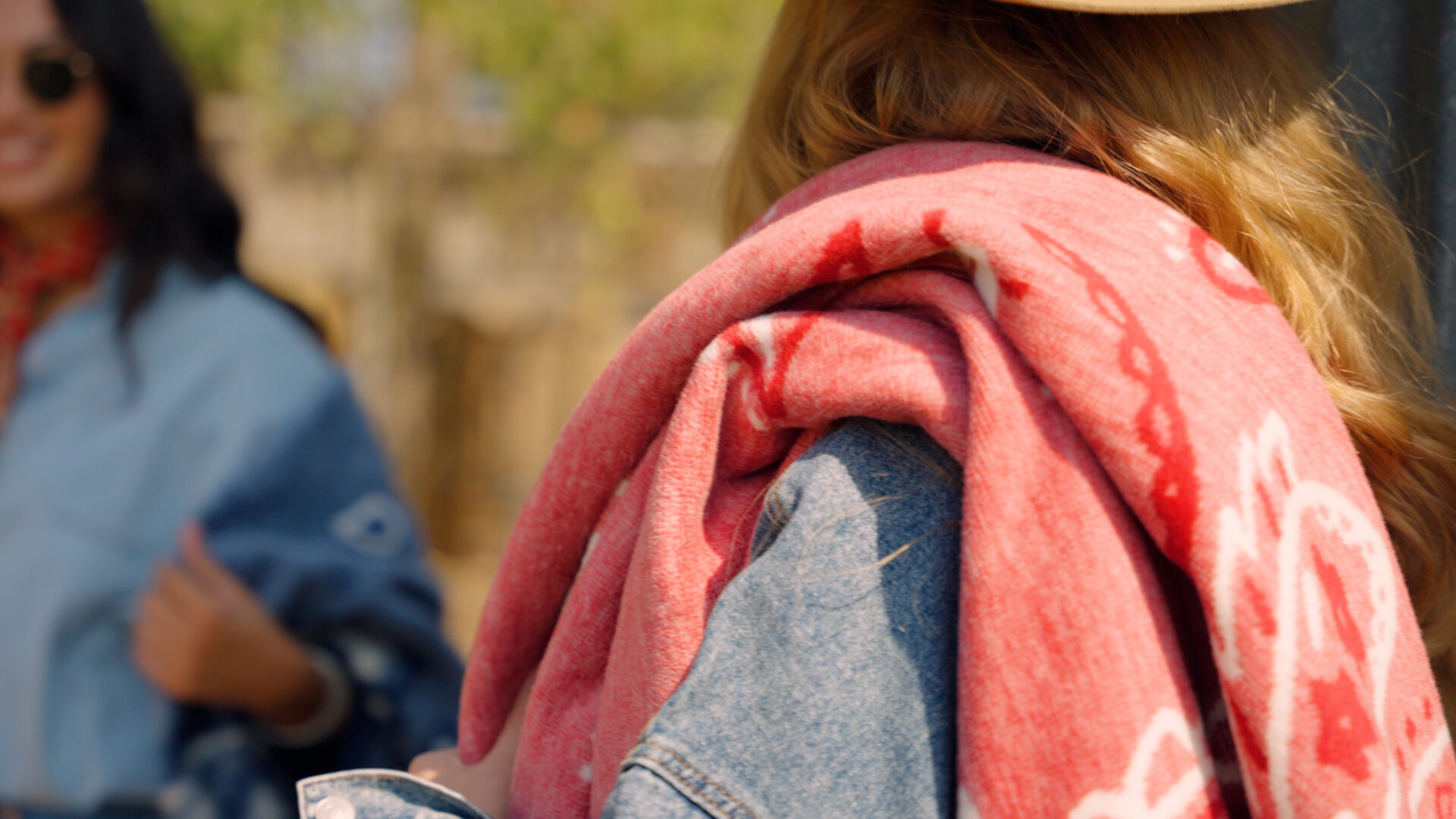 A woman with a Chappywrap blanket