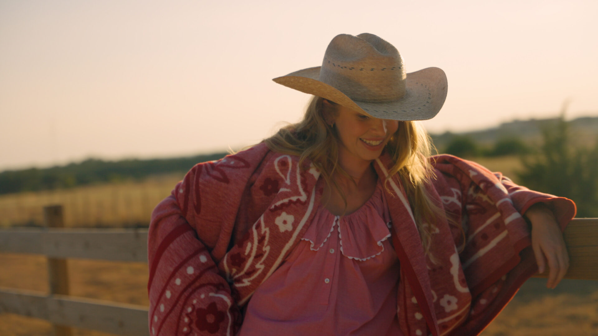 A woman with a Chappywrap blanket outside