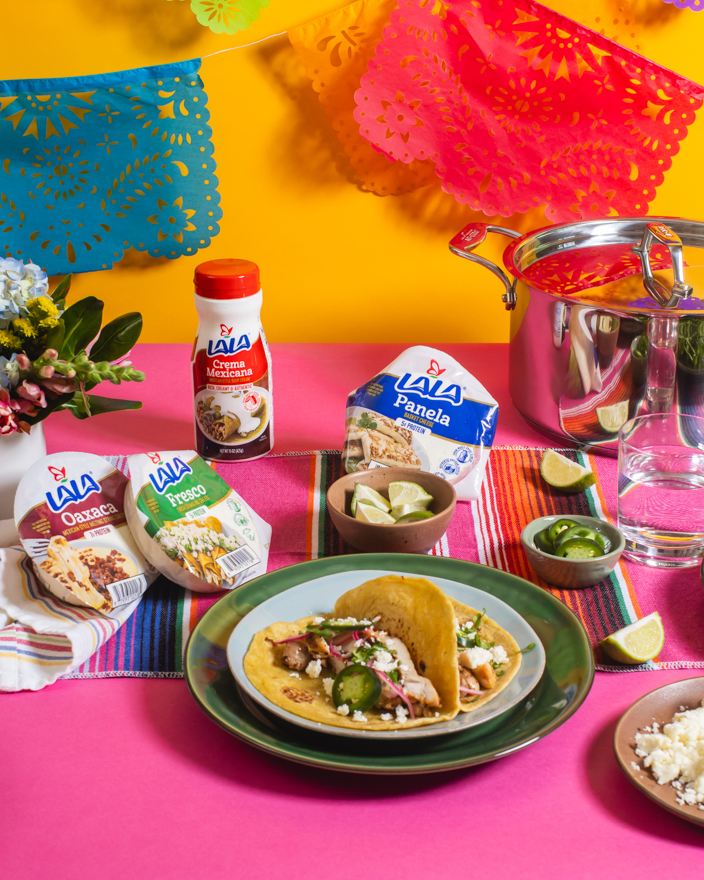 A traditional spread of Mexican food with Lala crema Mexicana