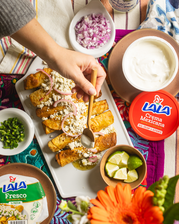 A traditional spread of Mexican food with Lala crema Mexicana