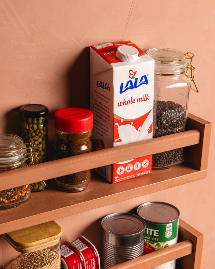 Lala foods shelf-stable milk in a pantry with other foods