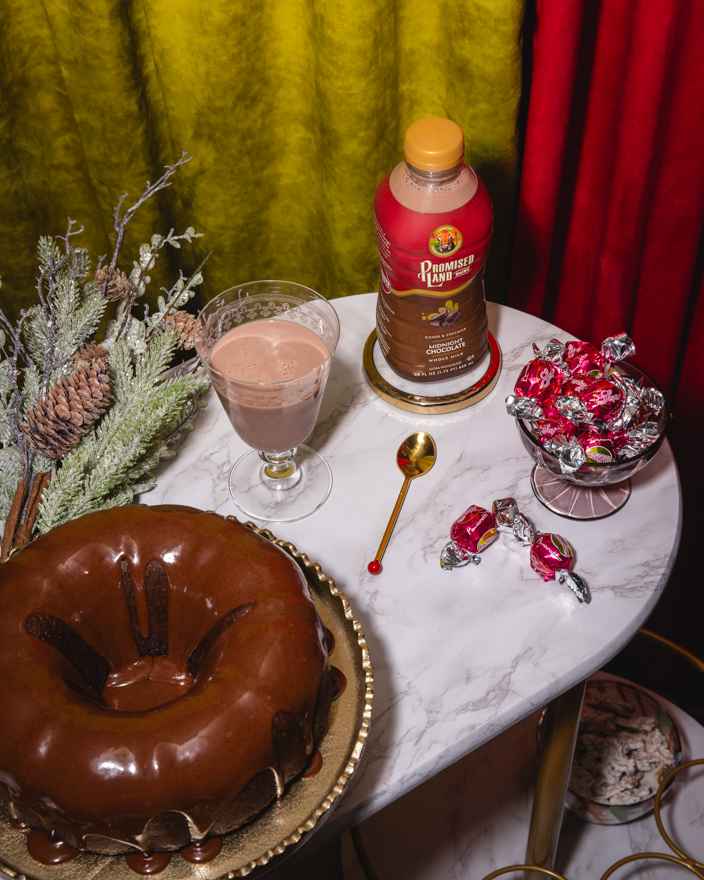 A dessert cart with chocolate cake and Promised Land Dairy chocolate milk