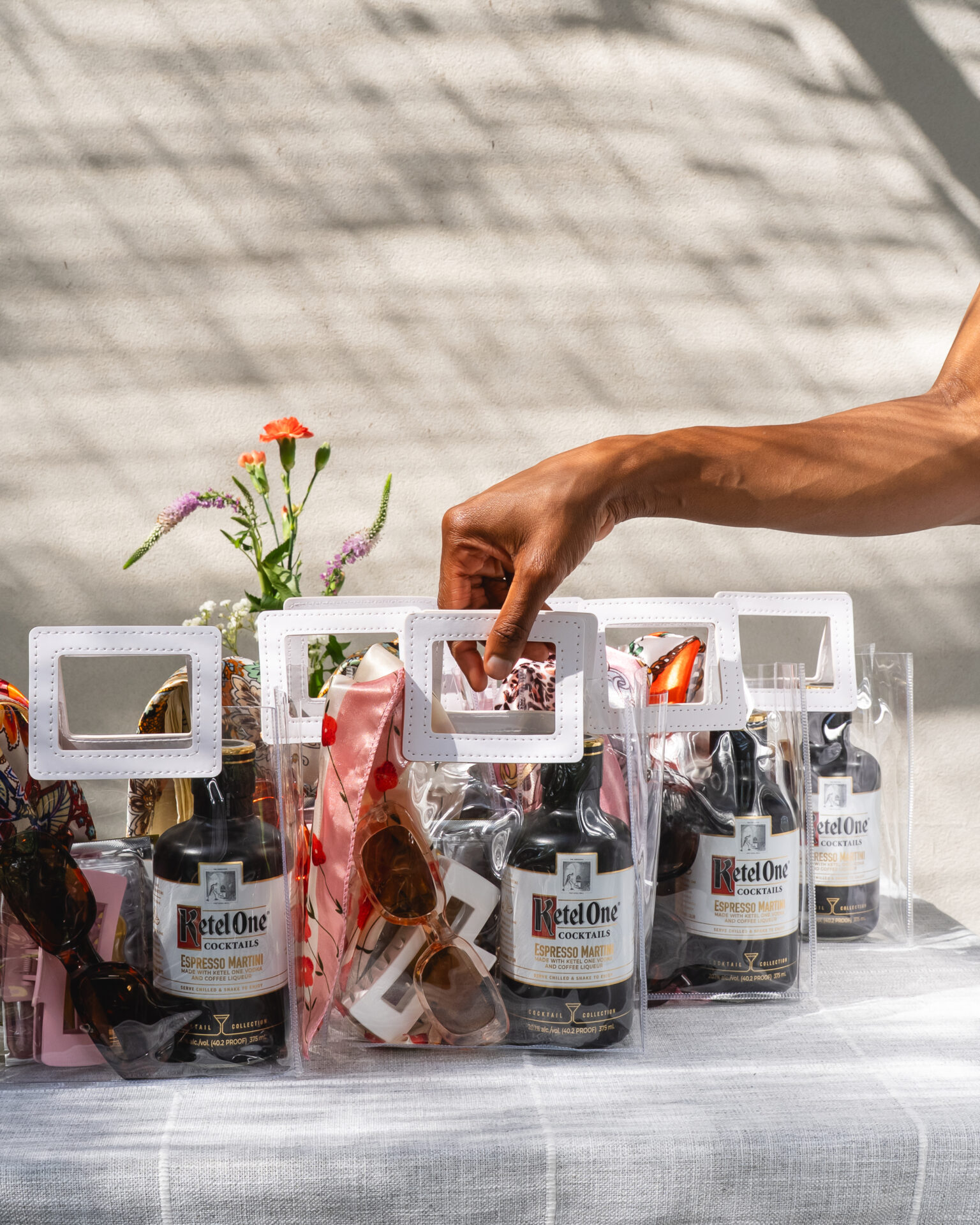 A woman grabbing a bag of party favors