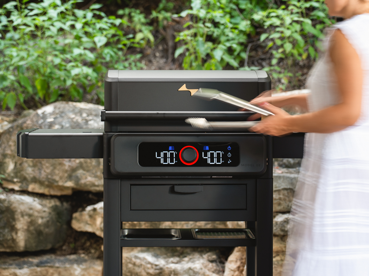 Outdoor lifestyle photography featuring the Current electric grill