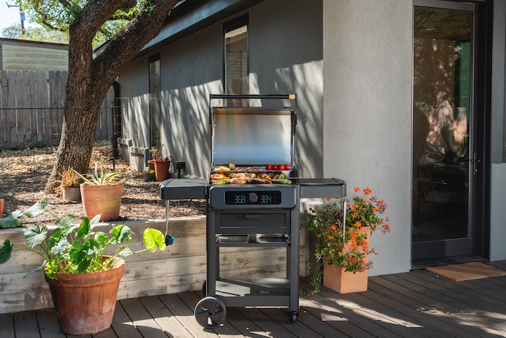 Lifestyle photography featuring the Current electric grill
