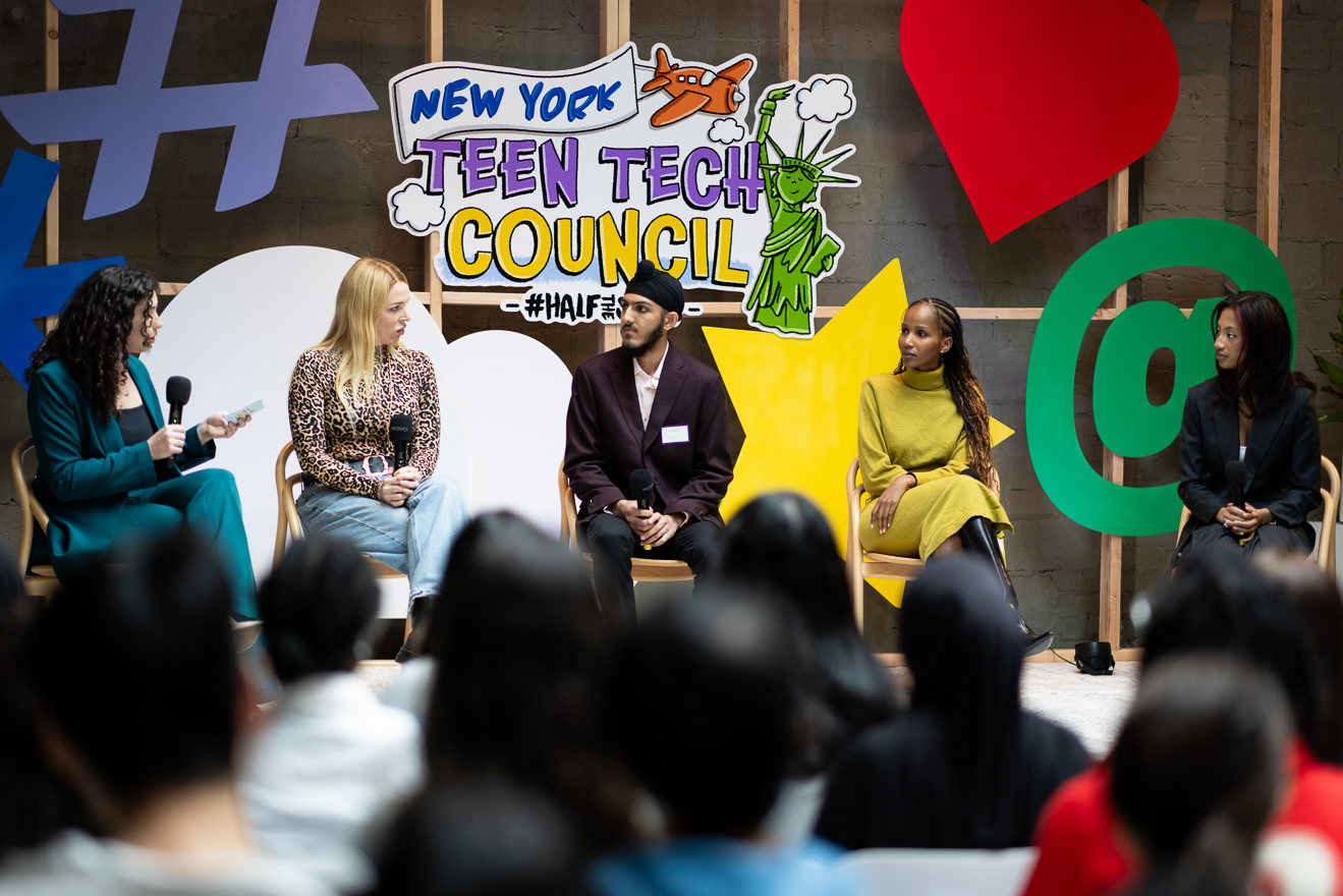 Speakers onstage at the HalfTheStory digital wellness event